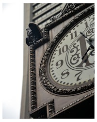 a clock on the side of a building