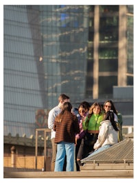 a group of people standing on a rooftop