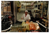 a woman is working in a market