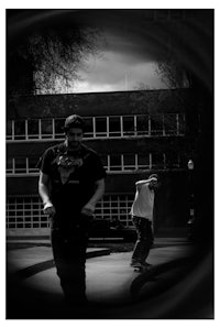 a man is riding a skateboard in front of a building